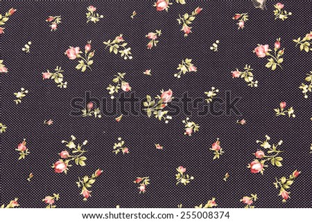 Dark blue cotton fabric in vintage roses pattern for background or texture