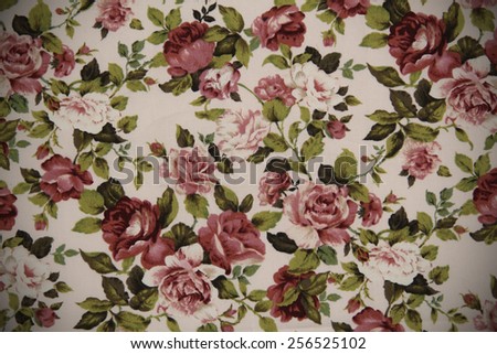 Pink cotton fabric in vintage roses pattern for background or texture