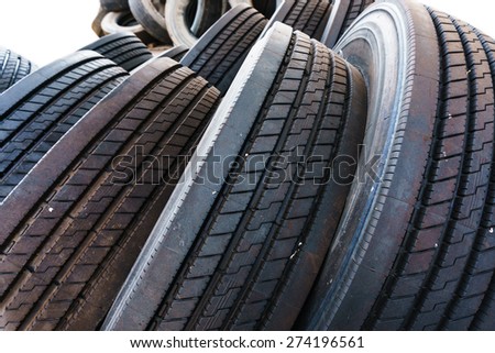 close up in tire heap with tires tread, used tires