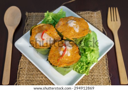 Fish curry in banana leaves is called Hor Mok serve in white plate, Thai Food