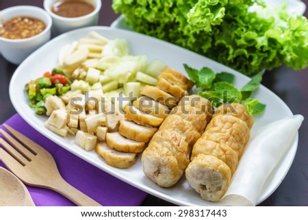 Nam Neung is Vietnamese Meatball Wraps served with vegetable and sauce, Vietnamese food
