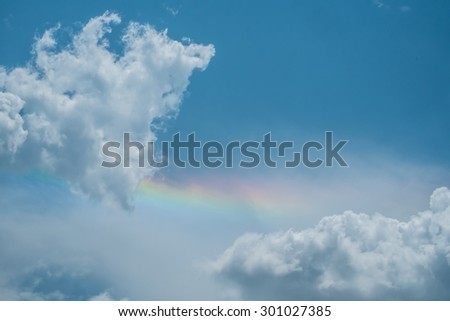 rainbow in sky with cloud, soft focus
