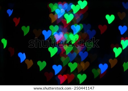 Heart Color Bokeh on a dark background.