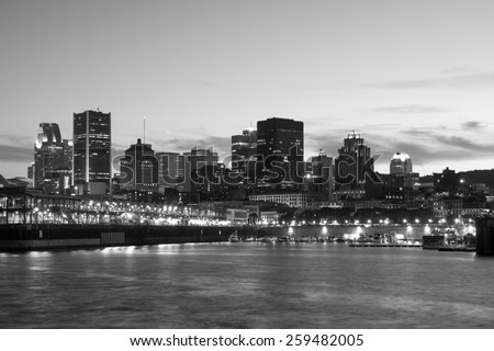 Skyline of Montreal, View from the Pierre-Dupuy street behind the river, in the black and white picture.