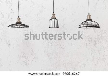 Industrial pendant lamps against rough wall, loft style