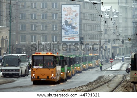 POZNAN, POLAND - JANUARY 16: Solemn farewell of high-floor buses in the parade, combined with the celebration of 85 years of bus service on January 16, 2010 in Poznan, Poland