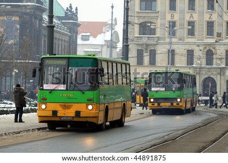 POZNAN, POLAND - JANUARY 16: Solemn farewell of high-floor buses in the parade, combined with the celebration of 85 years of bus service in Poznan on January 16, 2010 in Poznan, Poland