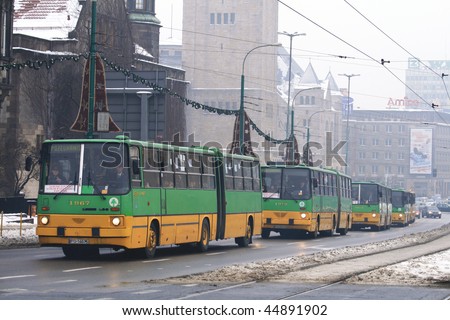 POZNAN, POLAND - JANUARY 16: Solemn farewell of high-floor buses in the parade, combined with the celebration of 85 years of bus service in Poznan on January 16, 2010 in Poznan, Poland
