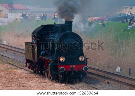 WOLSZTYN, POLAND - MAY 2: On the first weekend of May each year train enthusiasts from across the world descend on Wolsztyn to watch the Steam Parade, with more than a dozen steam trains on May 2, 2010 in Wolsztyn, Poland