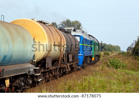Freight train passing the countryside