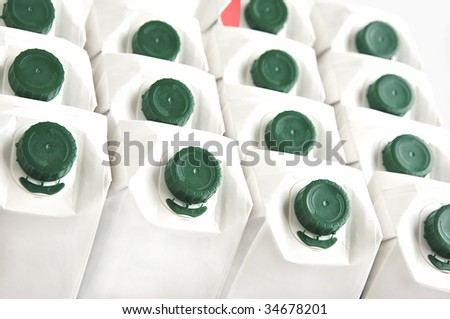 Background of white milk cartons.