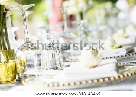 Elegance table set up with lotus flowers, selective focus. (set)