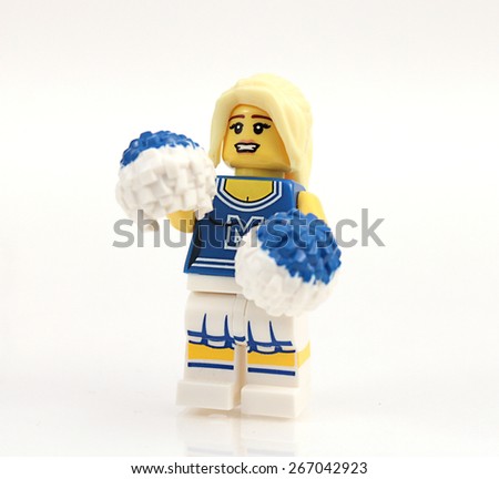 Colorado, USA - March 29, 2015: Studio shot of Lego cheerleader. Legos are a popular line of plastic construction toys manufactured by The Lego Group, a company based in Denmark.