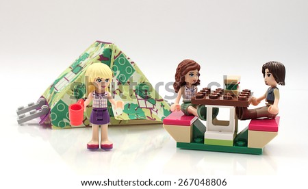 Colorado, USA - March 25, 2015: Studio shot of Lego minifigures camping. Legos are a popular line of plastic construction toys manufactured by The Lego Group, a company based in Denmark.