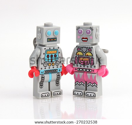 Colorado, USA - April 17, 2015: Studio shot of stack of Lego robots in love. Legos are a popular line of plastic construction toys manufactured by The Lego Group, a company based in Denmark.