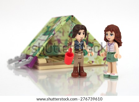 Colorado, USA - May 8, 2015: Studio shot of Lego couple camping. Legos are a popular line of plastic construction toys manufactured by The Lego Group, a company based in Denmark.
