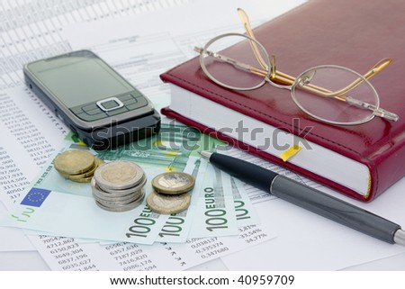 Business background with money and telephone