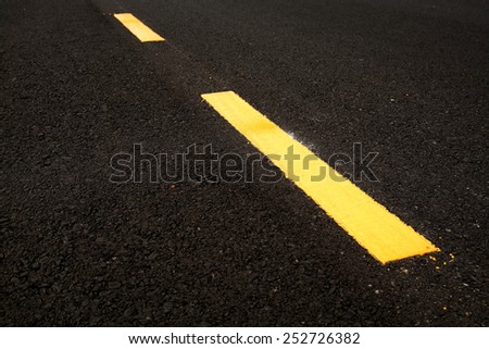 Yellow stripes on road