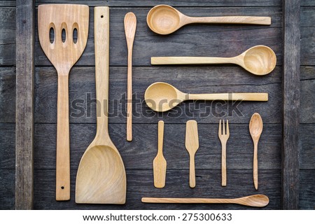 Top view image of wood spoons on wood board background