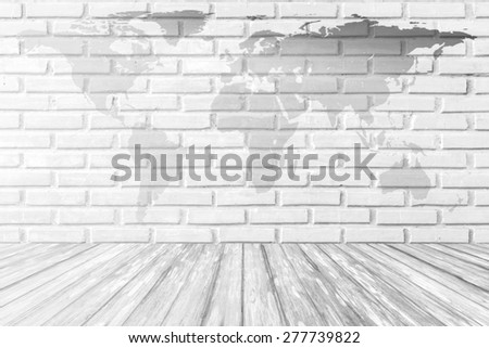 World map on white brick wall background with wood terrace