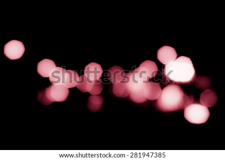Abstract pink lights in the dark background