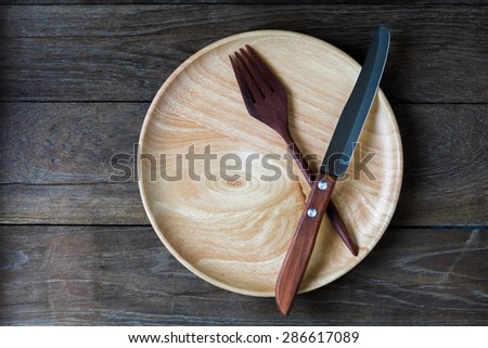 Wood utensils on wood board background
