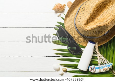Summer holiday background, Beach accessories on white wood table, Vacation and travel items