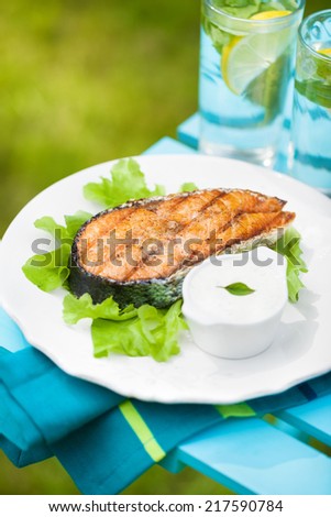 Grilled salmon steak outside