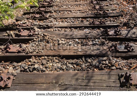 old railway, railroad, rail track , abandoned, destroyed and overgrown wood