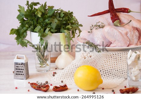 for roasting chicken, marinade for chicken, spices for meat, cook in the oven, homemade food, stuffed chicken with greens and lemon.