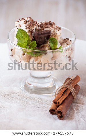 banana ice cream with chocolate and cinnamon. cooling dessert.\
homemade ice cream.  ice cream with cinnamon and chocolate, ice cream.