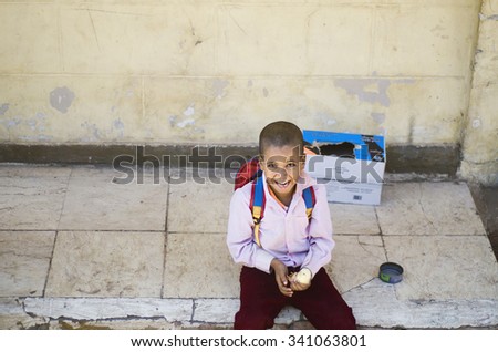 MOUNT SINAI, EGYPT - October 30, 2015: Portrait of unknown Smiling Boy with Spring Chick