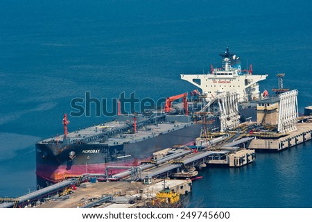 Nordbay tanker at an oil terminal in the port of Nakhodka.  Far East of Russia, East (Japan) Sea. 22.04.2014