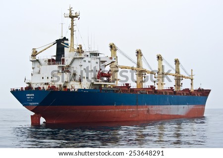 Bulk carrier Angara at anchor in the roads. Nakhodka Bay. East (Japan) Sea. 09.04.2014