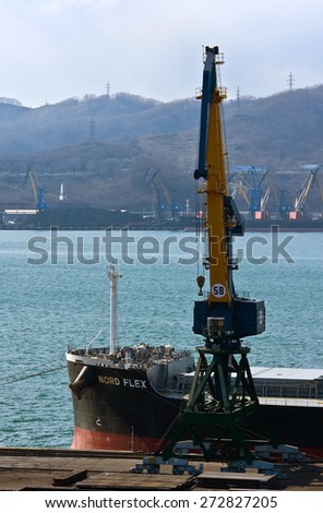 The bow of a huge bulk carrier Nord Flex standing at the pier in the port of Nakhodka. East (Japan) Sea. 24.04.2015