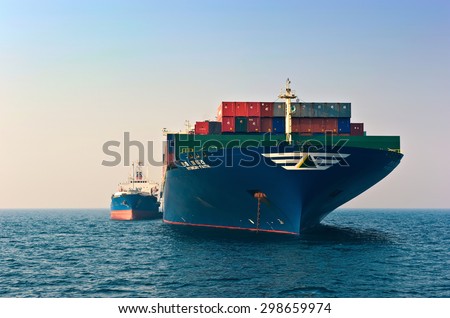 Bunkering tanker Ostrov Russkiy container ship Hyundai company. Nakhodka Bay. East (Japan) Sea. 19.04.2014