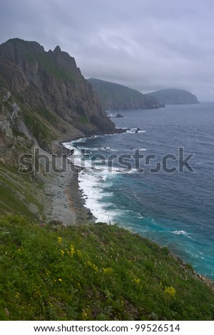 Seascape with high cliffs and the sea a formidable storm. Japan Sea.