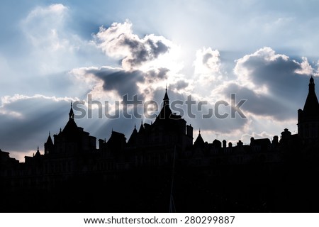 Fairy Tale-like Castle Silhouette with God Rays and Blue Sky in London