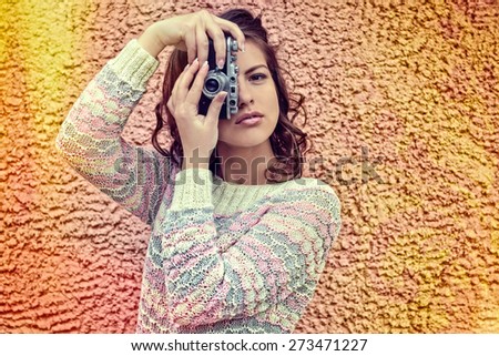 Portrait woman with old camera