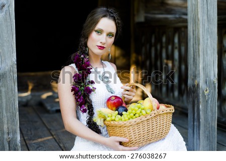 The young girl with a basket of fruit, hot summer, the bride