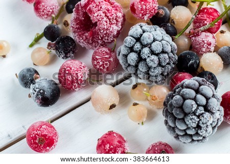 frozen berries: black currant, red currant, blackberry, blueberry, white currant. top view, macro.