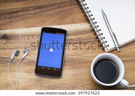 CHIANGMAI, THAILAND -JULY 19, 2015:LG Nexus5 opened to Facebook app. Facebook is is an online social networking service founded in February 2004 by Mark Zuckerberg.