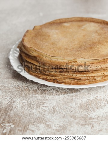 Baking. Russian pancakes. Russian cuisine. Taste pancakes. Blini. Butter Week. Pancake week. Blinis. Flour. Meal. Taste pancakes