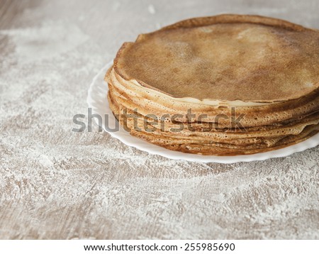 Russian pancakes. Russian cuisine. Taste pancakes. Blini. Maslenitsa. Butter Week. Pancake week. Cheesefare Week. Blinis. Flour. Meal. Taste pancakes. Baking