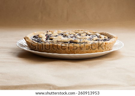 Blackberry pie. black currant pie in vanilla powder. Powdered sugar. Blackberry cake on desk. Bake with vanilla powder. Baking