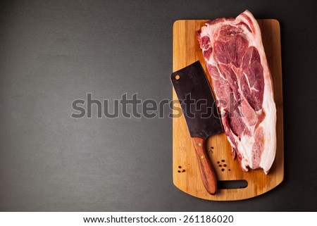 Meat pork fresh. Raw meat on cutting board. Spice and meat. Axe and meat pig. Fat piece