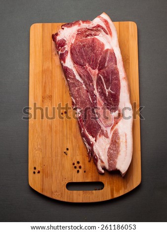 Meat pork fresh. Raw meat on cutting board. Spice and meat. Fat piece