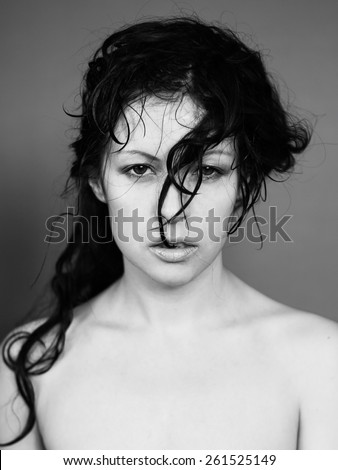 Wet woman. Raw hair lady. Brunette girl. Portrait face white woman. Wet hair. Passion. Hairstyle