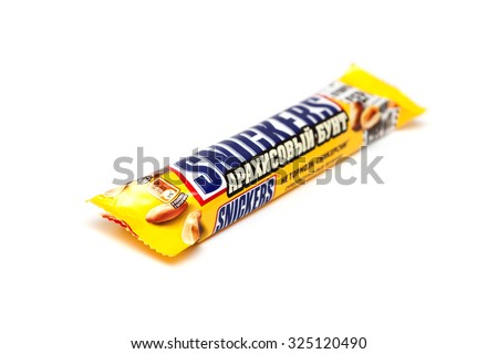 ORENBURG, RUSSIA - OCTOBER 6, 2015: Snickers Peanut Riot Limited Edition double chocolate bar made by Mars, Inc. Isolated on white background