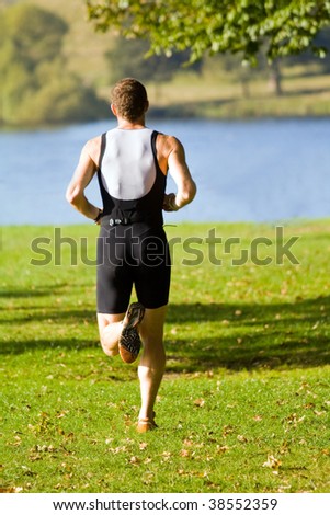 a man running in the park to keep fit